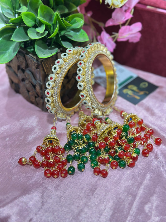 Brass Rajwadi Kada Set with Red & Green Stones and Pearl Latkans